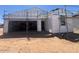 Exterior shot of a home under construction with scaffolding and unfinished facade at 47720 W Kenner Dr, Maricopa, AZ 85139