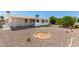 Backyard featuring a covered patio, desert landscaping and minimal lawn at 5122 E Emerald Cir, Mesa, AZ 85206