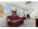 Comfortable living room with ample natural light and tasteful decor, creating a serene atmosphere at 5122 E Emerald Cir, Mesa, AZ 85206