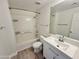 Clean bathroom features modern vanity, toilet and shower with tub at 615 E Portland St # 261, Phoenix, AZ 85004