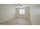 A bedroom has wood floors, a ceiling fan, and a window with blinds at 615 E Portland St # 261, Phoenix, AZ 85004