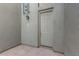 Exterior view of a unit's front door with a lantern-style light fixture and unit number 261 at 615 E Portland St # 261, Phoenix, AZ 85004