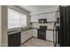 Modern kitchen features updated appliances, updated countertops and window at 615 E Portland St # 261, Phoenix, AZ 85004
