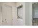 A clean laundry area with a stacked washer and dryer at 615 E Portland St # 261, Phoenix, AZ 85004