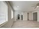 An open living room with modern appliances and wood-style flooring at 615 E Portland St # 261, Phoenix, AZ 85004