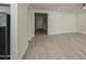 Spacious living room with wood floors providing a view of the entryway and stairs at 615 E Portland St # 261, Phoenix, AZ 85004
