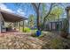 Expansive backyard with multiple patios, inviting pool, and lush landscaping at 6418 E Sunnyside Dr, Scottsdale, AZ 85254