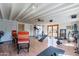 Large gym area with weights, machines, and light wood floors at 6418 E Sunnyside Dr, Scottsdale, AZ 85254