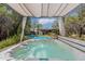 Hot tub beneath a fabric canopy looks out over a beautiful back yard and pool at 6418 E Sunnyside Dr, Scottsdale, AZ 85254