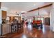 Expansive living area featuring an open concept kitchen, dining, and living room layout at 6418 E Sunnyside Dr, Scottsdale, AZ 85254