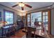 Charming office space showcasing two work areas with views of the home's open floor plan at 6418 E Sunnyside Dr, Scottsdale, AZ 85254