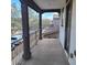 Outdoor balcony offering views of the neighborhood, designed with sturdy posts and railing at 6908 S 8Th Dr, Phoenix, AZ 85041