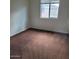 Bedroom featuring carpet flooring and a window at 6908 S 8Th Dr, Phoenix, AZ 85041