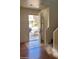 Inviting entryway with wood-look floors and a view to the outside at 6908 S 8Th Dr, Phoenix, AZ 85041