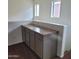 Loft area featuring additional cabinet space and windows for natural light at 6908 S 8Th Dr, Phoenix, AZ 85041