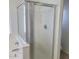 Bright bathroom with glass shower door and chrome fixtures at 6908 S 8Th Dr, Phoenix, AZ 85041