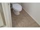Close up of a white toilet at 6908 S 8Th Dr, Phoenix, AZ 85041