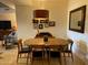 Cozy dining room features a wooden table with seating for six and a decorative lighting fixture at 7157 E Rancho Vista Dr # 1004, Scottsdale, AZ 85251