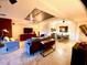Bright open living space with modern furnishings, recessed lighting, and stylish decor with a dining area in the background at 7157 E Rancho Vista Dr # 1004, Scottsdale, AZ 85251