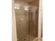 Tiled shower with a clear glass door and showerhead at 7157 E Rancho Vista Dr # 1004, Scottsdale, AZ 85251
