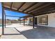 A covered patio offers an incredible view of the backyard and pool at 7231 W Sierra Vista Dr, Glendale, AZ 85303