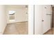 Bedroom with neutral tones and a door to the ensuite bathroom at 7231 W Sierra Vista Dr, Glendale, AZ 85303