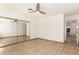 Bedroom with mirrored closet and natural lighting at 7231 W Sierra Vista Dr, Glendale, AZ 85303