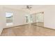 Neutral bedroom with sliding mirror door closet and natural light at 7231 W Sierra Vista Dr, Glendale, AZ 85303