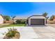 Charming single-story home featuring a well-manicured lawn and attached two car garage at 7231 W Sierra Vista Dr, Glendale, AZ 85303