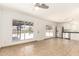 Bright kitchen and dining area with stainless steel appliances and views of backyard pool at 7231 W Sierra Vista Dr, Glendale, AZ 85303