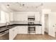 Kitchen with stainless steel appliances, including range and sink at 7231 W Sierra Vista Dr, Glendale, AZ 85303