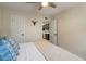 Bedroom featuring a bed and an open doorway providing a glimpse into the adjacent kitchen at 782 W Gail Dr, Chandler, AZ 85225