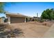 Charming single-story home with a two-car garage and low maintenance desert landscaping at 782 W Gail Dr, Chandler, AZ 85225