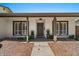 Charming home entrance featuring a decorative door, covered porch, and well-maintained landscaping at 782 W Gail Dr, Chandler, AZ 85225
