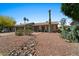 Landscaped front yard with desert plants, stone accents and a charming single-story home at 782 W Gail Dr, Chandler, AZ 85225