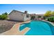 Back of home featuring a sparkling pool with diving board, ideal for outdoor enjoyment and relaxation at 782 W Gail Dr, Chandler, AZ 85225