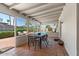 Bright sunroom with tiled floor, dining table, and views of the backyard and sparkling pool at 782 W Gail Dr, Chandler, AZ 85225