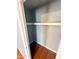 Empty closet with hardwood floors and a shelf, ready for customizable storage solutions at 7903 N 61St Ave, Glendale, AZ 85301