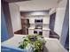 Updated kitchen features stainless steel appliances and quartz countertops at 7903 N 61St Ave, Glendale, AZ 85301