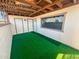 Covered patio with outdoor carpeting and window offering natural light and airflow at 7903 N 61St Ave, Glendale, AZ 85301