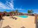 Community pool surrounded by lounge chairs, perfect for relaxation and fun in the sun at 7903 N 61St Ave, Glendale, AZ 85301