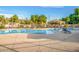 A serene community pool with lounge chairs, inviting residents to relax and enjoy the sunny outdoor space at 8113 W Groom Creek Rd, Phoenix, AZ 85043