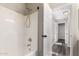 This bathroom features a shower with a shower head and tile floors at 8433 E Natal Cir, Mesa, AZ 85209