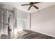 Empty bedroom with a closet, light walls, and laminate flooring at 8433 E Natal Cir, Mesa, AZ 85209