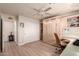 Neutral-toned bedroom complete with built-in Murphy bed and work space at 8818 N 47Th Ln, Glendale, AZ 85302