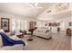 Spacious living room features modern furnishings, ample light, and an open floor plan at 8818 N 47Th Ln, Glendale, AZ 85302