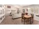 Inviting living room features abundant natural light, and a dining area for versatile living at 8818 N 47Th Ln, Glendale, AZ 85302