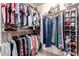 Spacious walk-in closet with ample storage and shelving for optimal organization at 8818 N 47Th Ln, Glendale, AZ 85302