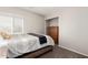 Bedroom with a dresser and blind covered window, providing natural light at 901 N Quartz St, Gilbert, AZ 85234