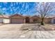 Charming single-story home with well-maintained landscaping and a cozy, inviting facade at 901 N Quartz St, Gilbert, AZ 85234